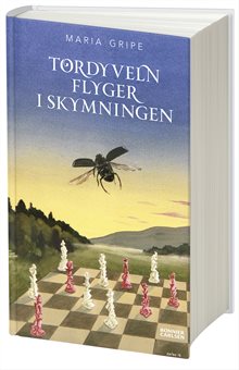 Tordyveln flyger i skymningen